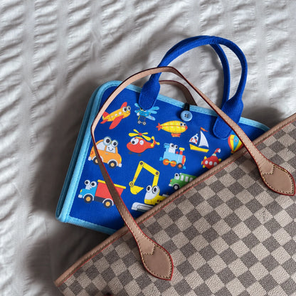 Maletín azul Zyvarn cerrado dentro de una bolsa.